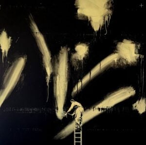 image of a man on a ladder, trying to paint a wall